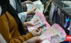 Jelang Akhir Pekan, Rupiah Dibuka Menguat Tipis ke Posisi Rp18.123 per Dolar AS